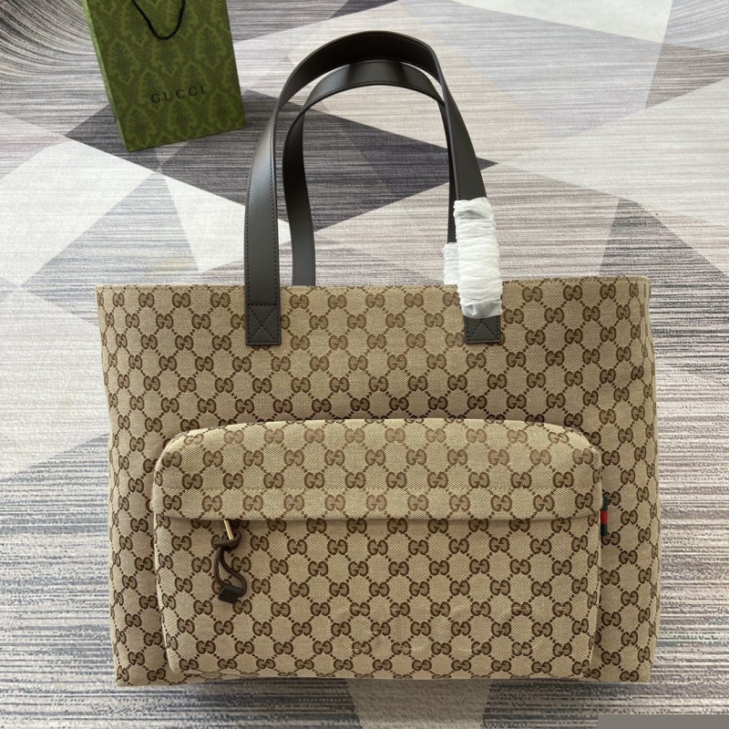 G*u*i shopping bags